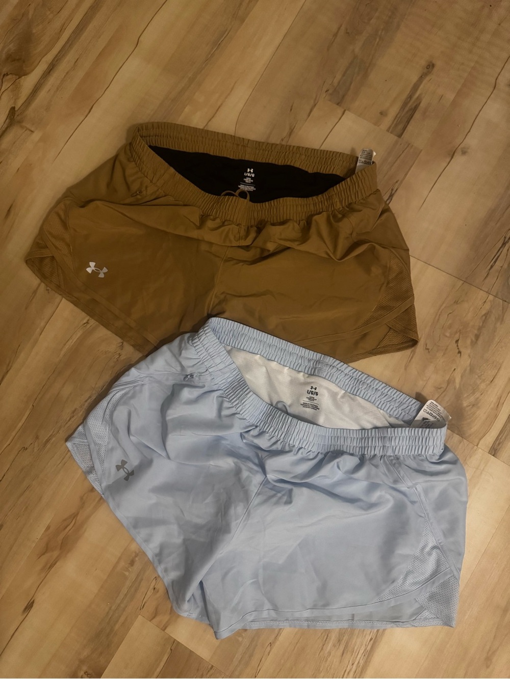 Under Armour Women’s Athletic Shorts in Light Blue and Tan